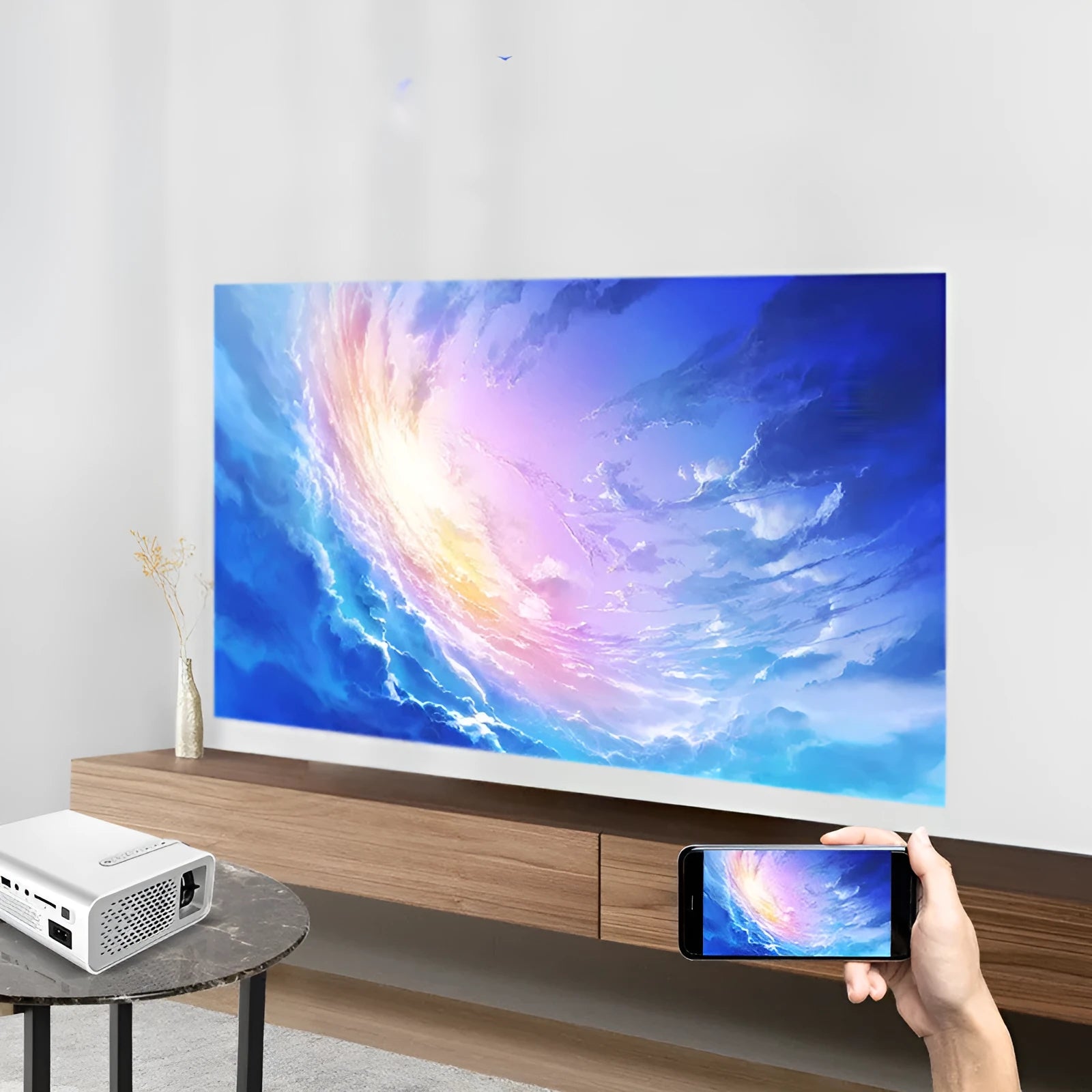 YG530 mini mobile phone projector in black or white with wireless connectivity and LED projection