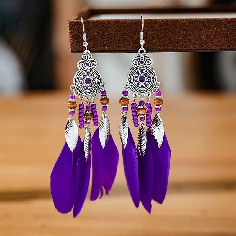 Feather pattern drop earrings with round oil craft design in alloy with electroplated finish