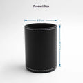 Round black leather pen container showing cylindrical shape and compact size for desk organisation.
