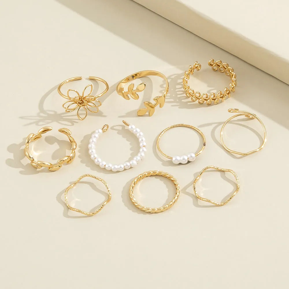 Gold openwork flower ring set for women with intricate floral designs