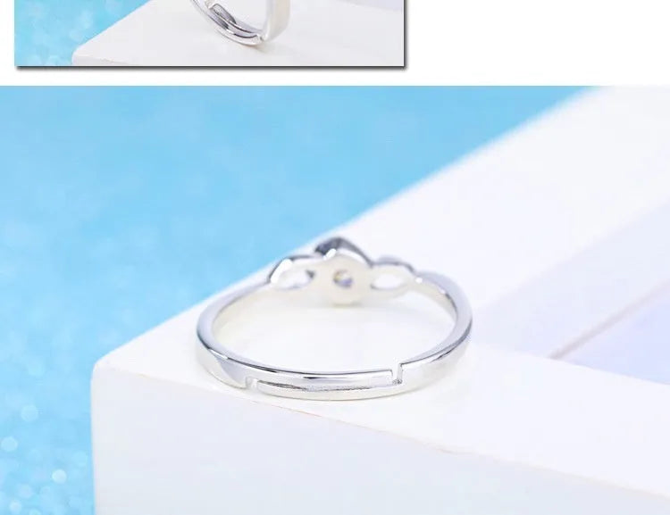Korean style silver interwoven heart ring with adjustable opening, white diamond finish, copper base
