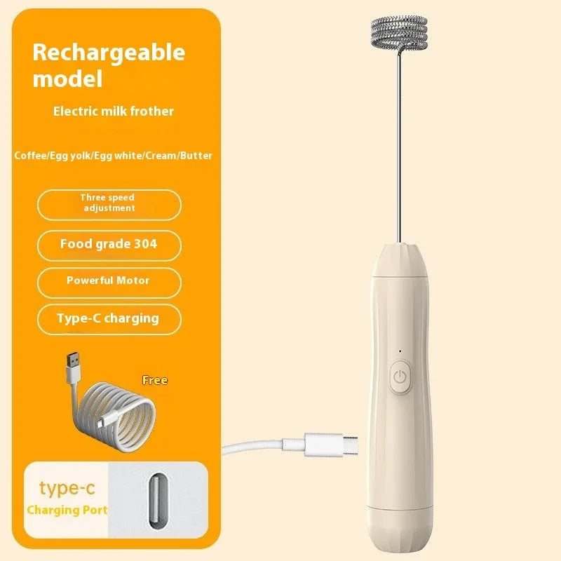 Black handheld electric milk frother with stainless steel whisk and USB charging port