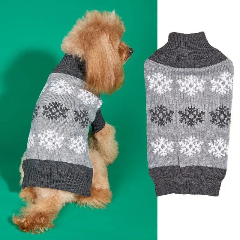 Dark brown and grey knitted dog sweater with snowflake patterns, size label shown.