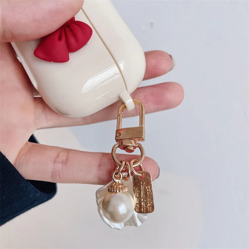Beige red bow shell TPU clamshell case for AirPods wireless earphones