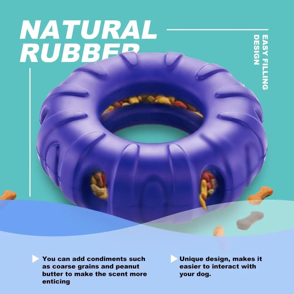 Blue natural rubber tyre-shaped dog chew toy and slow feeder on a wooden floor