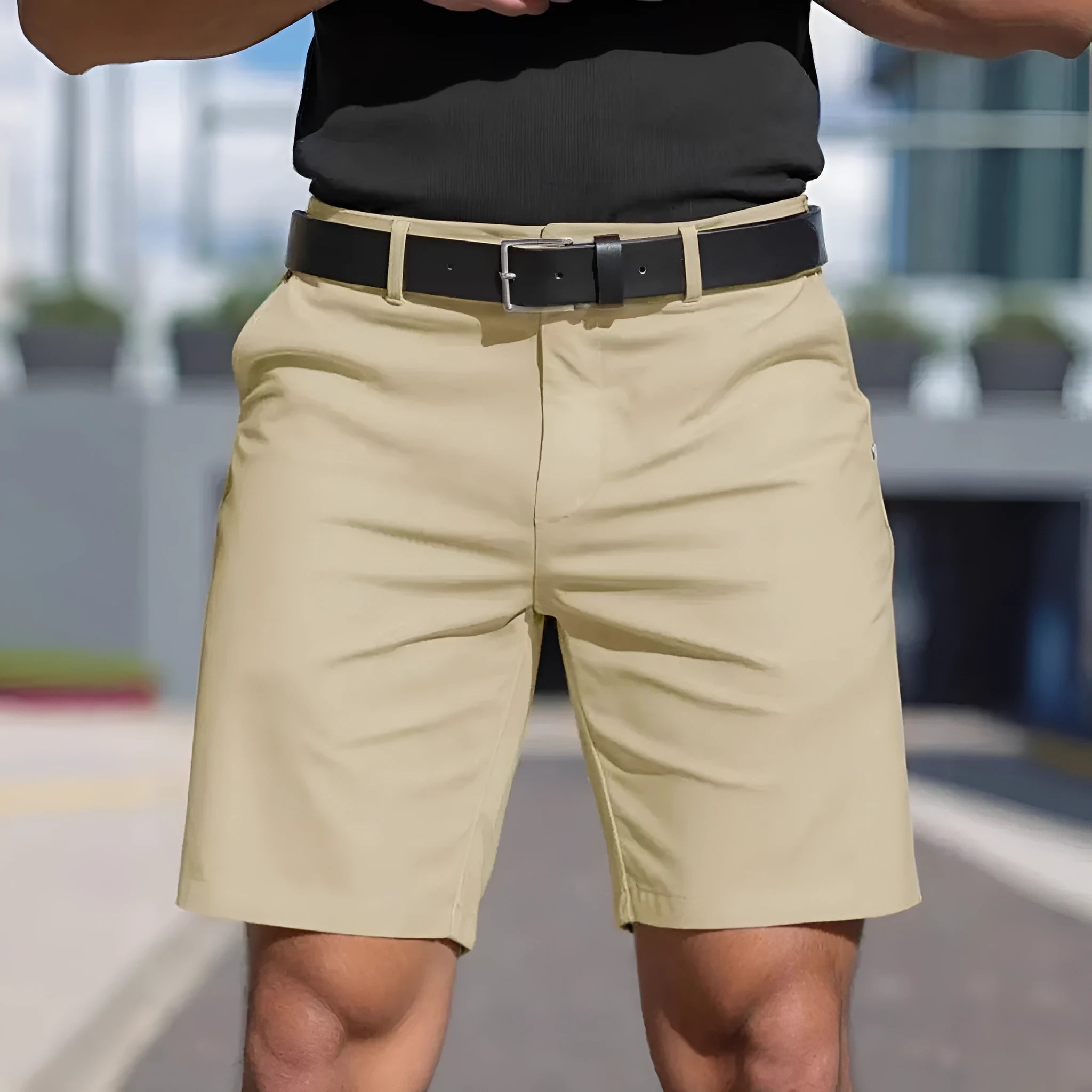 Men's solid colour straight-leg polyester shorts with micro elasticity, shown in apricot.