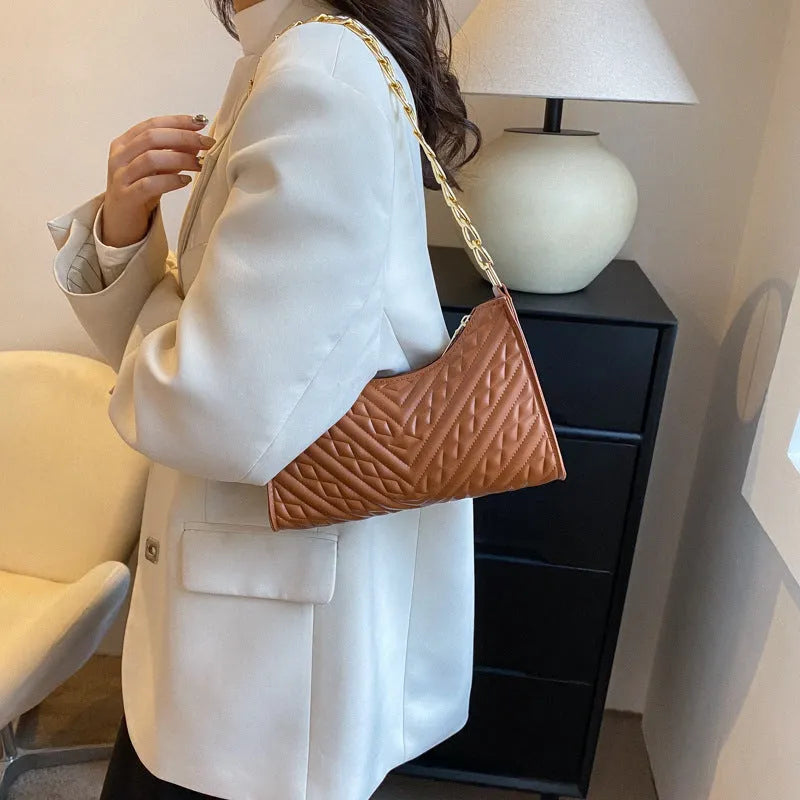 Brown PU leather pleated chain baguette shoulder bag with adjustable strap and soft carry handle