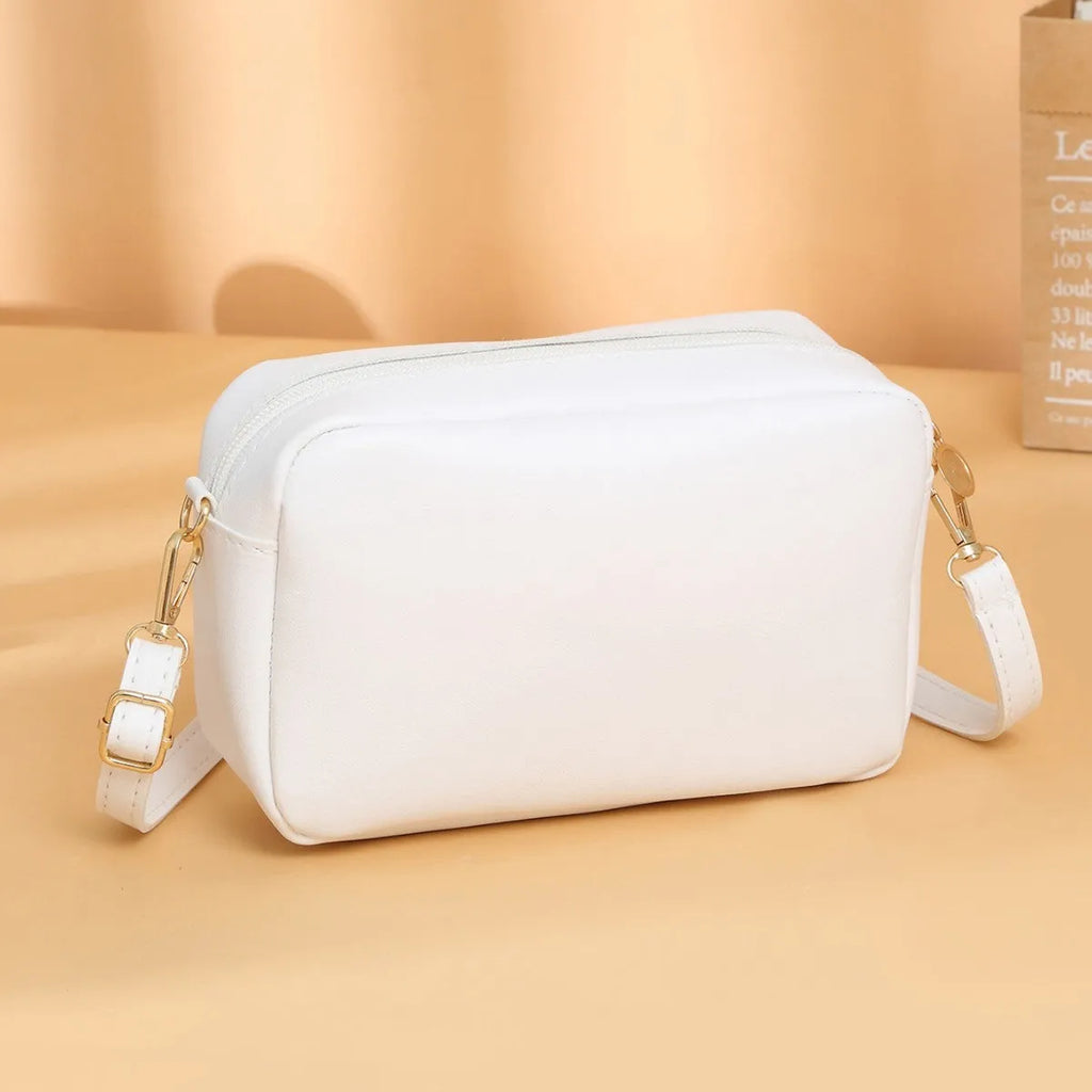 Women's solid colour PU leather shoulder bag with three-dimensional pockets in urban simplicity style