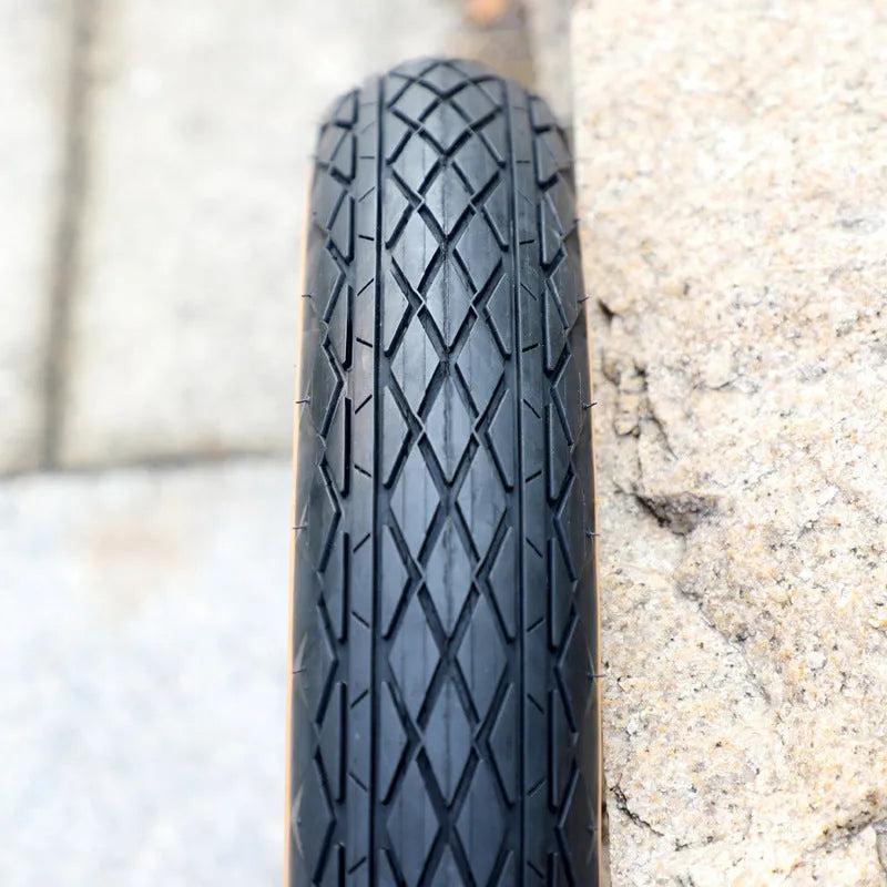Brown rubber tyre with skin edge pattern for snowmobiles and electric beach carts, 20x4.0 inch dimensions