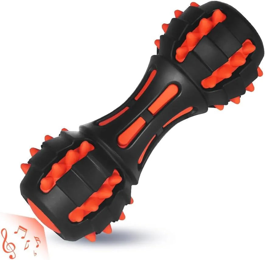 Red rubber dumbbell-shaped dog chew toy with textured surface for dental cleaning