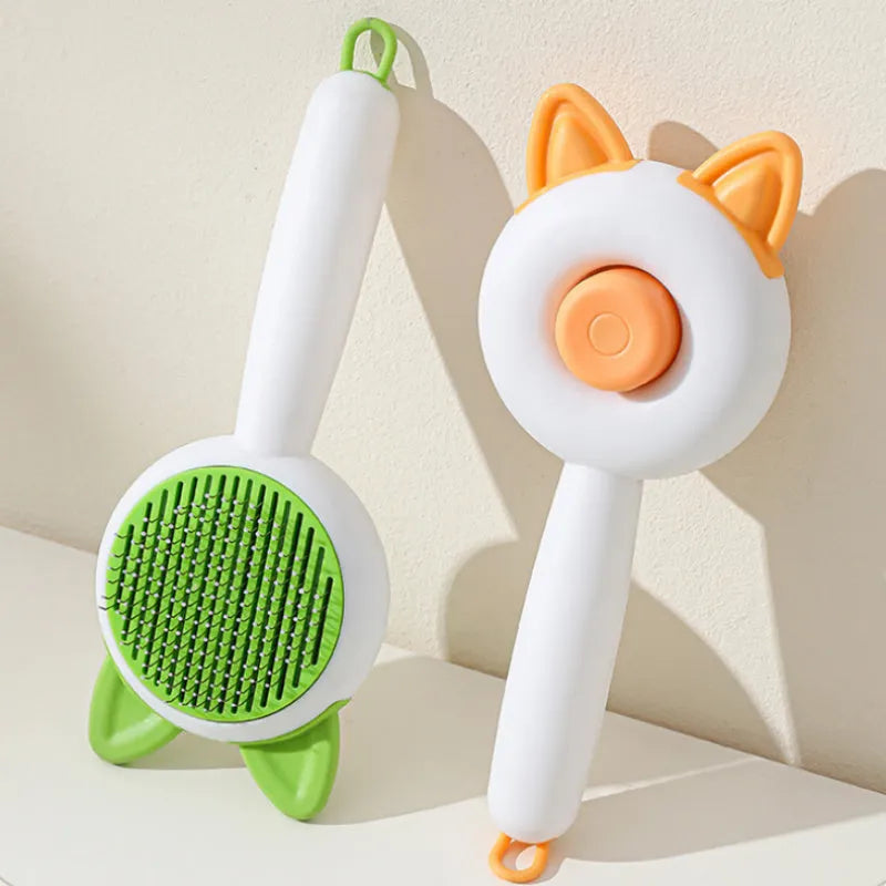 Self-cleaning pet grooming comb for cats in greenish white colour with stainless steel teeth