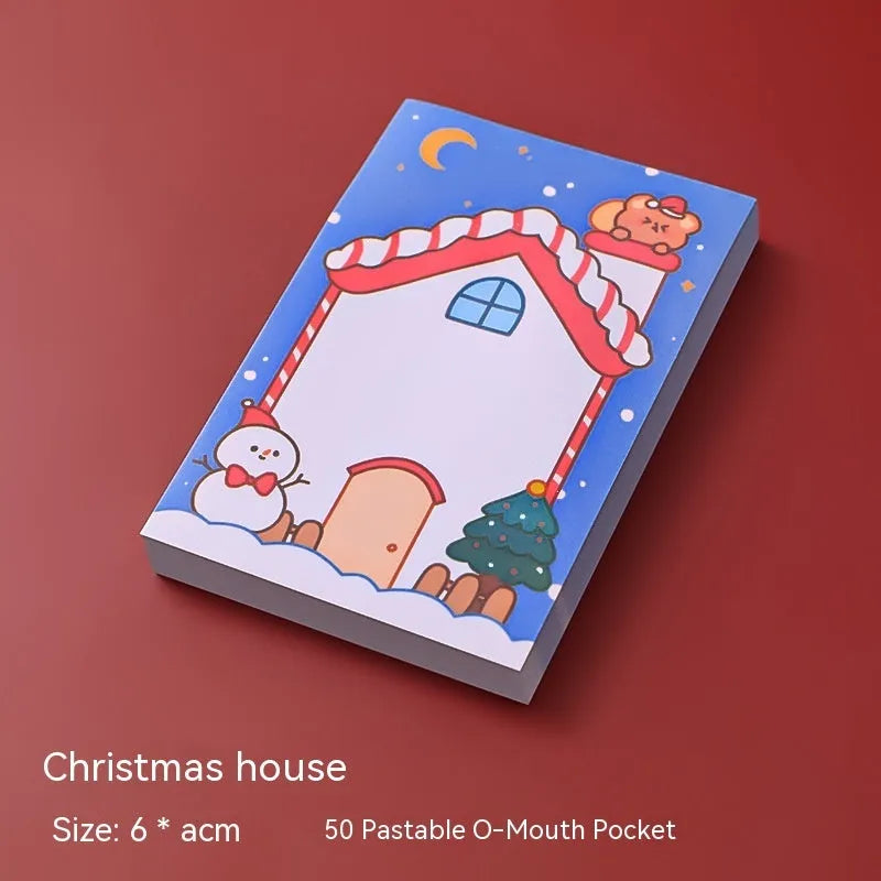 Christmas cartoon sticky notes stationery book with holiday designs including elf, gift, sled and Santa Claus