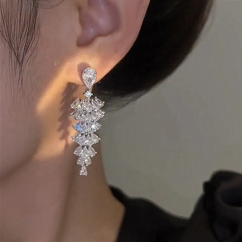Silver pagoda Christmas tree drop earrings with sparkling zircon crystals on copper stud earrings