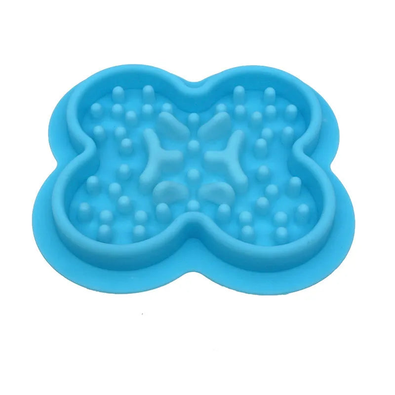 Blue silicone pet licking mat with textured grooves and a non-slip base for cats and dogs.