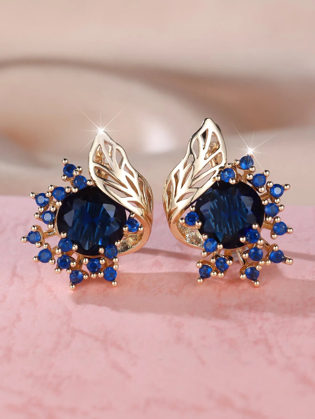 Round flowers feather zircon earrings in rose gold electroplated finish with multiple diamond colour options