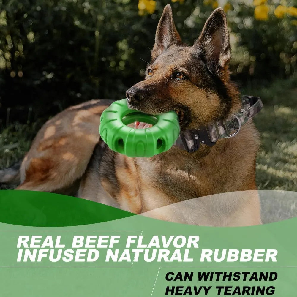 Blue natural rubber tyre-shaped dog chew toy and slow feeder on a wooden floor