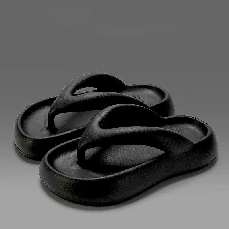 Solid colour women's flip-flops with a thick sole, decorative bow, and thong strap.