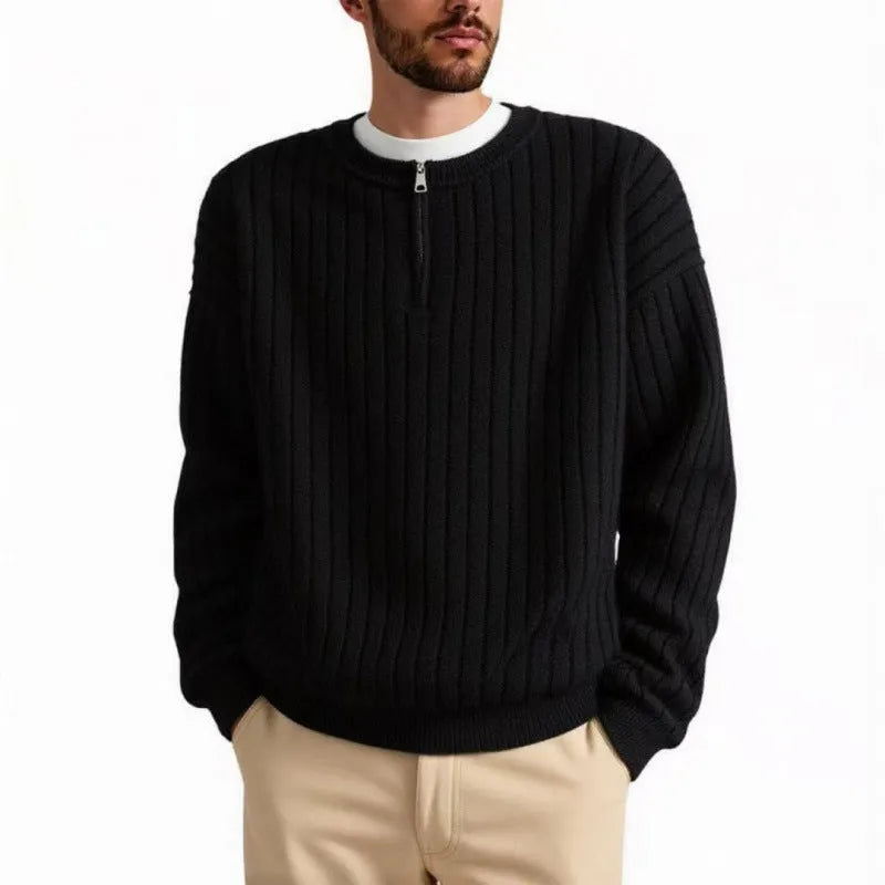 Men's grey loose fit half-zip pullover sweater with textured knit and long sleeves.