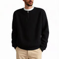 Men's grey loose fit half-zip pullover sweater with textured knit and long sleeves.