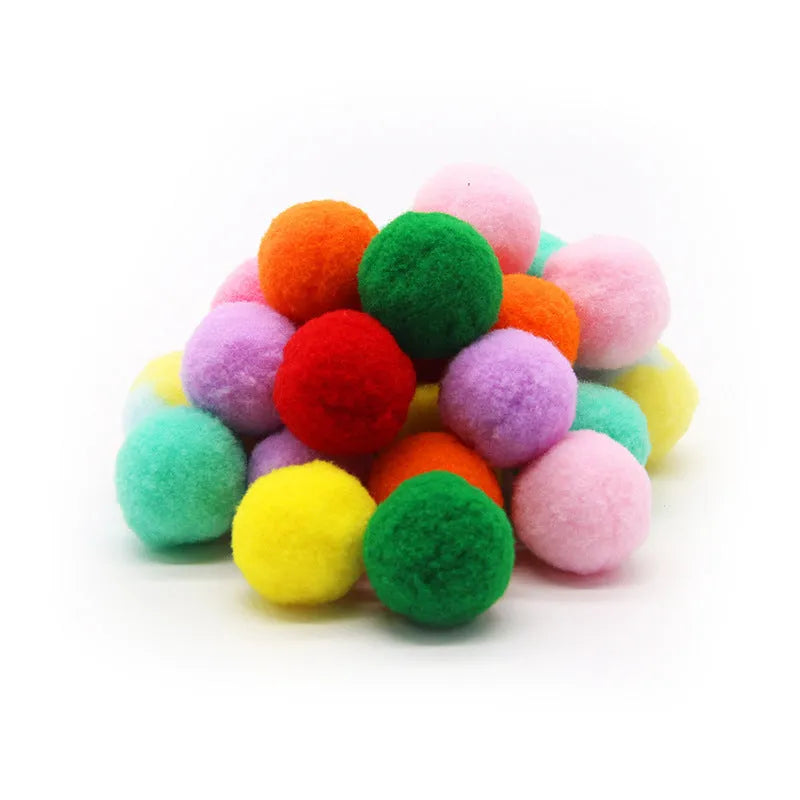 Pet toy launcher gun with assortment of soft plush balls for dog fetching games