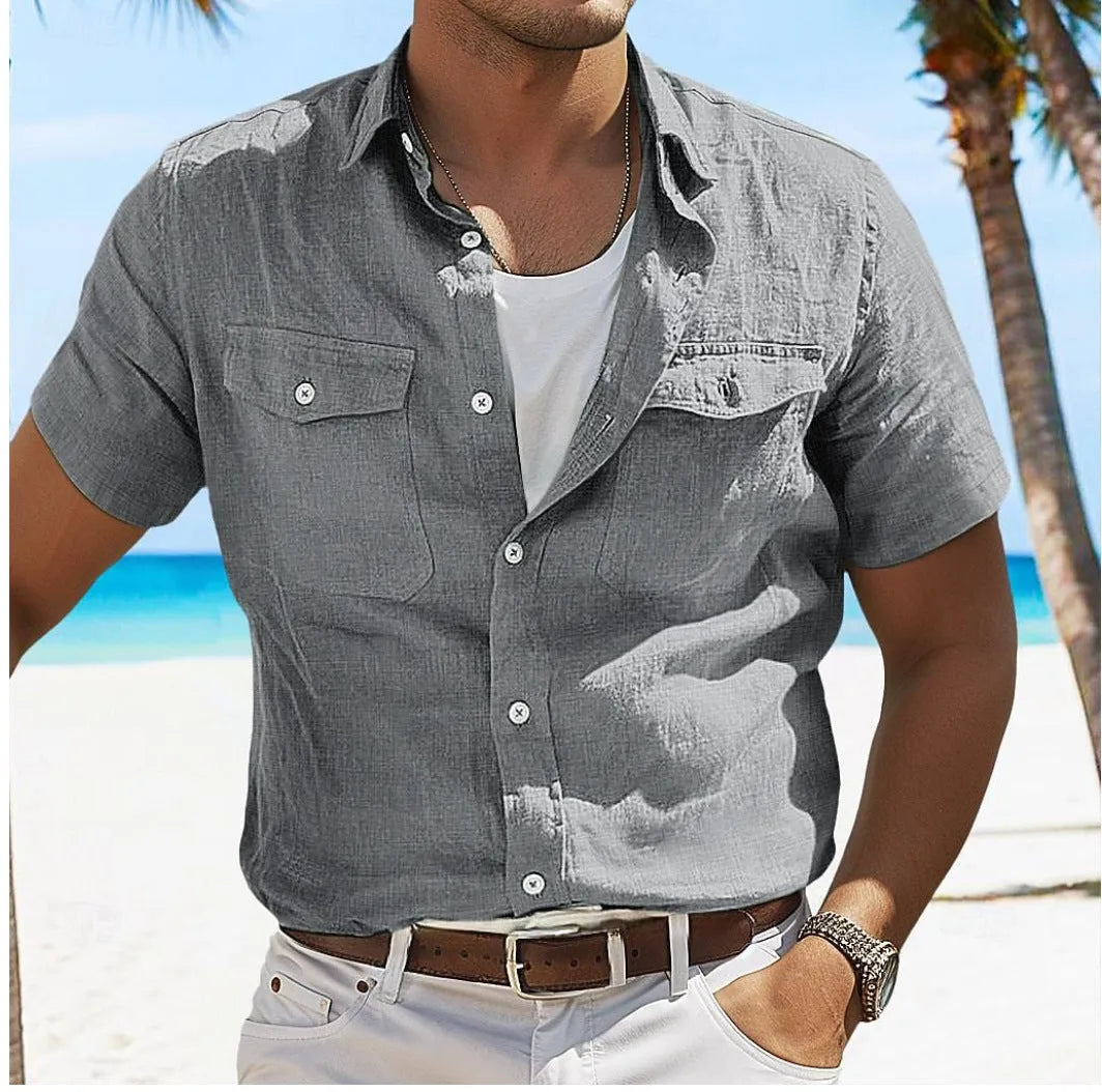 Men's loose grey linen shirt with polo collar and long sleeves on a hanger.