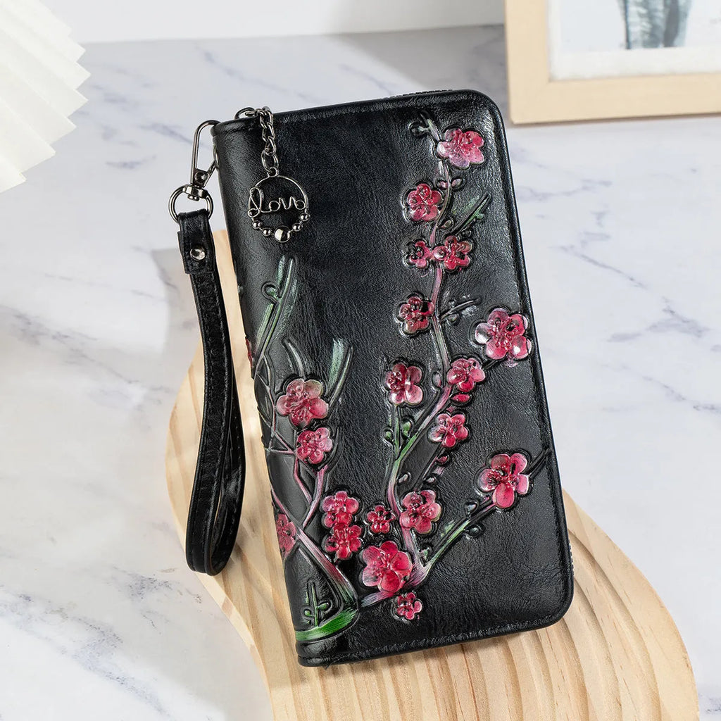 Embossed floral pattern Chinese style handbag in brown colour with zipper closure