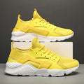 Men's low top casual shoes with mesh upper and cross shoulder straps in fluorescent colours