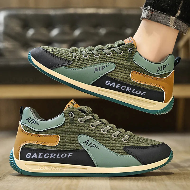 Men's green and grey lightweight mesh running shoes with lace-up front and round toe.