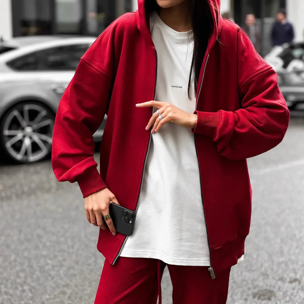 Street style loose-fit two-piece set with long-sleeved coat and trousers in grey.