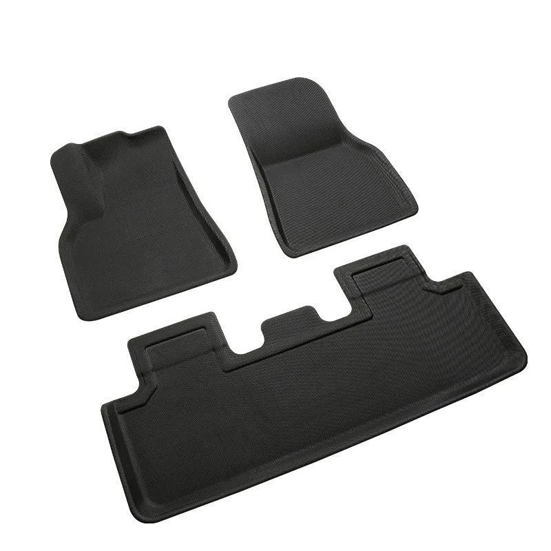 TPR floor mat set for Tesla Model Y showing footwell, storage box, and tailbox mats.