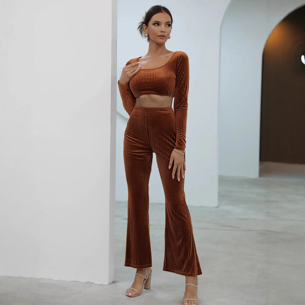 Caramel-coloured long sleeve sweater and trouser set on hanger