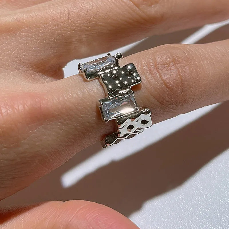 Silver cross zircon ring with open gemstone design and geometric three-dimensional decoration in retro style