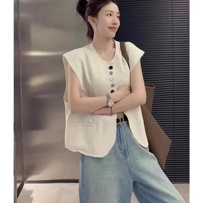 Women's Milky White V-neck polyester vest with side pockets, shown on a model.