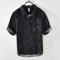 Men's black and white short-sleeved polo shirt with lapel collar and loose cardigan fit
