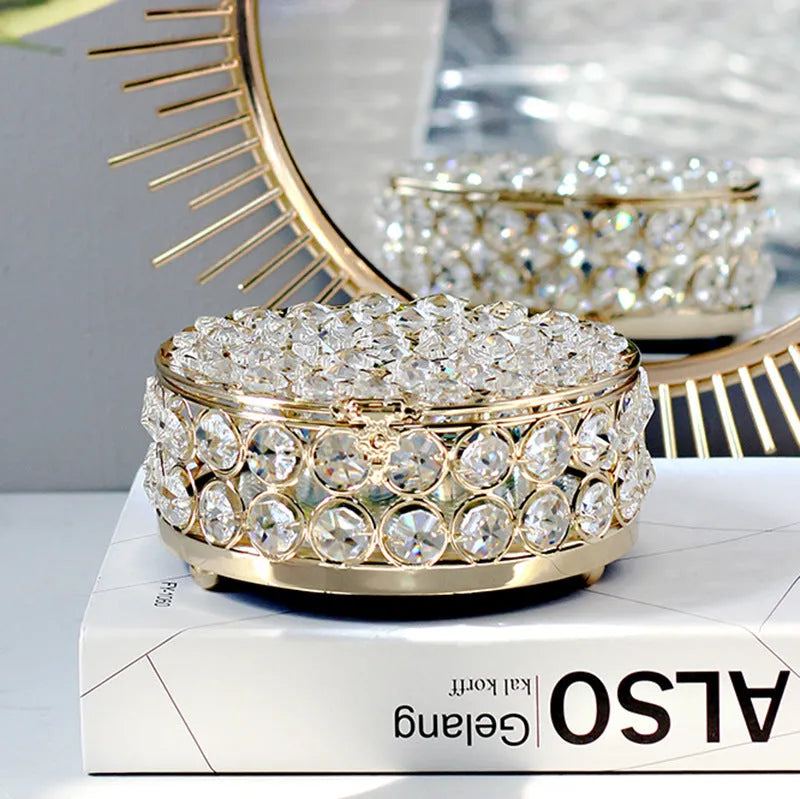 French gold European style jewellery storage box with transparent crystal glass sides and lid.