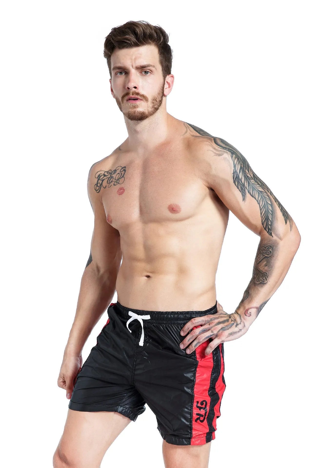 Men's blue stretch polyester sports shorts with lace-up front and slim fit.