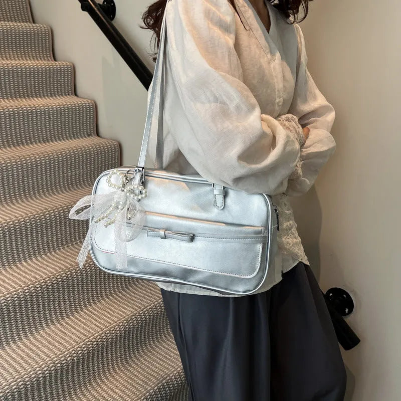 Women's black PU leather single-shoulder flap bag with a phone pocket and double-joint straps.