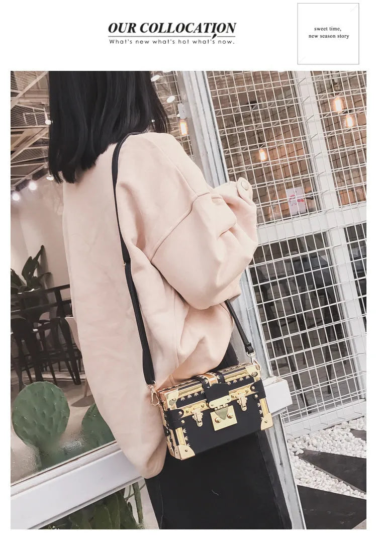 Women's black PU leather shoulder bag with flap closure and adjustable crossbody strap