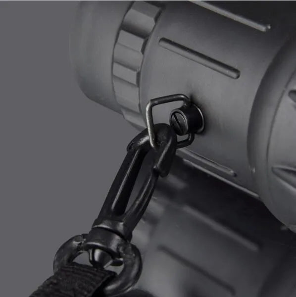 Black 16x52 high-power monocular with waterproof body and enhanced green film lenses.