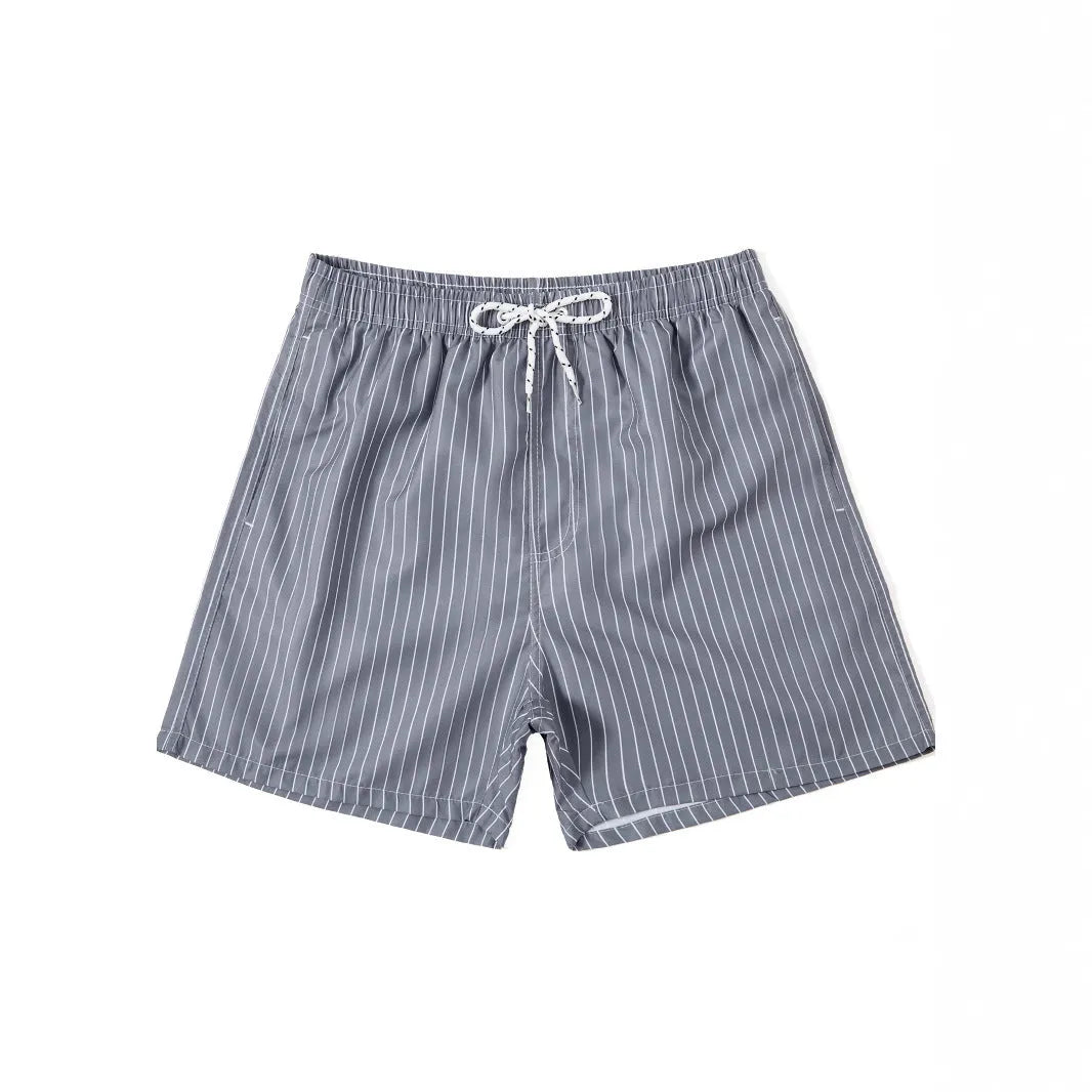 Striped men's beach shorts in navy blue with straight leg opening and polyester fabric