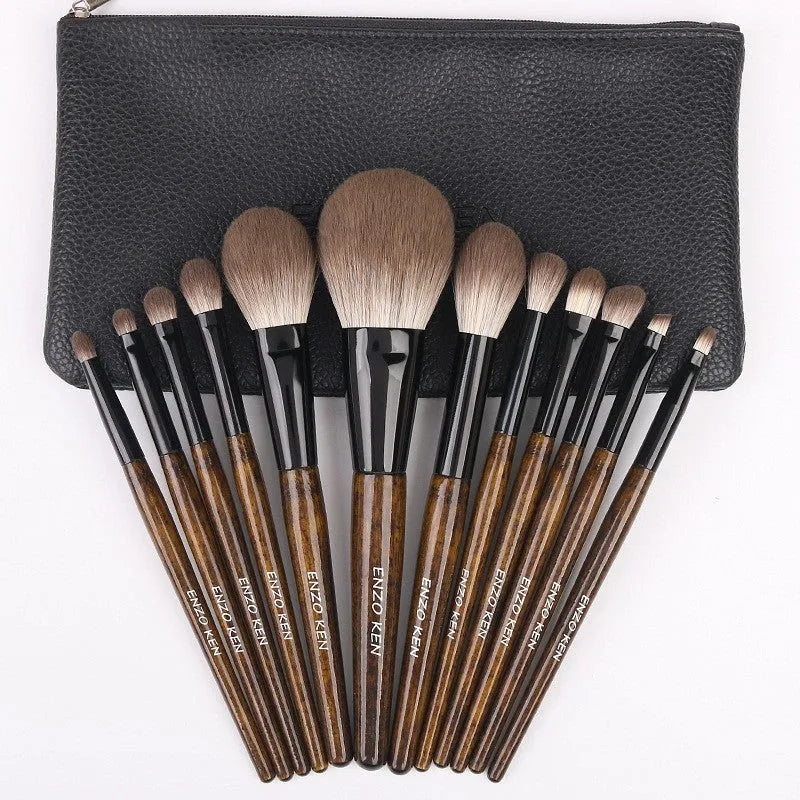 12 piece makeup brush set with wooden handles in a grey PU storage bag