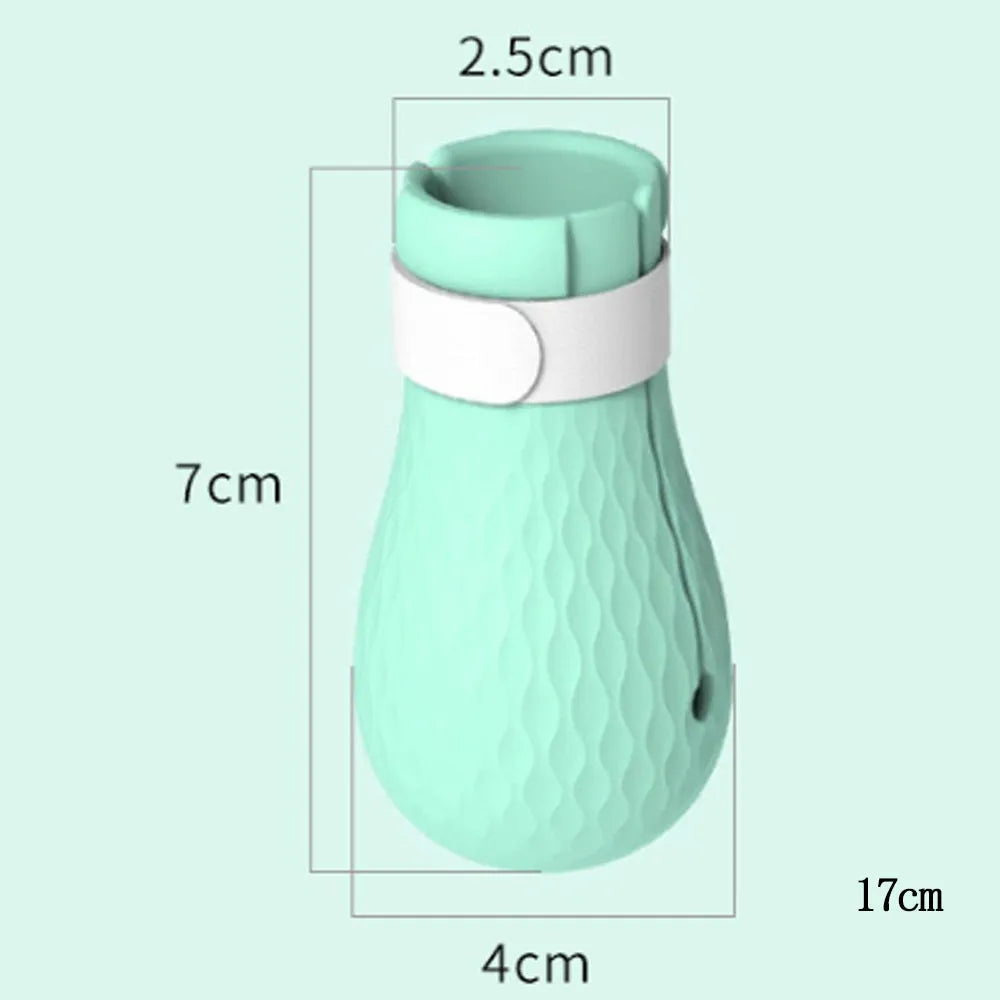 Green silicone cat anti-scratch gloves covering hands and lower arms for pet protection