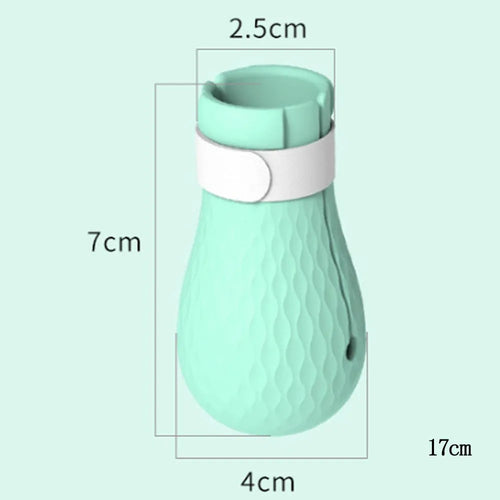 Green silicone cat anti-scratch gloves covering hands and lower arms for pet protection