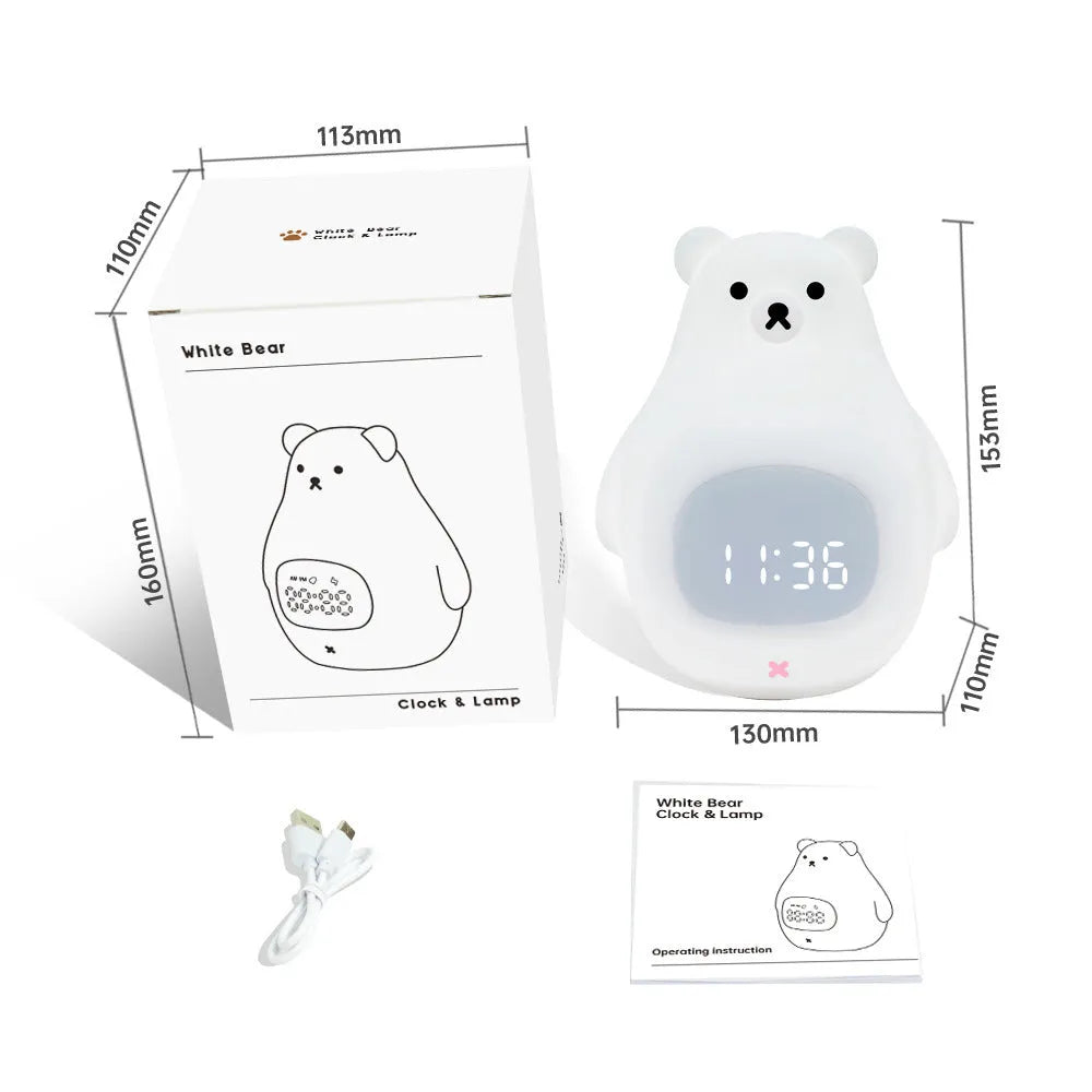 White silicone bear-shaped night light with timer and alarm clock functions on a bedside table.