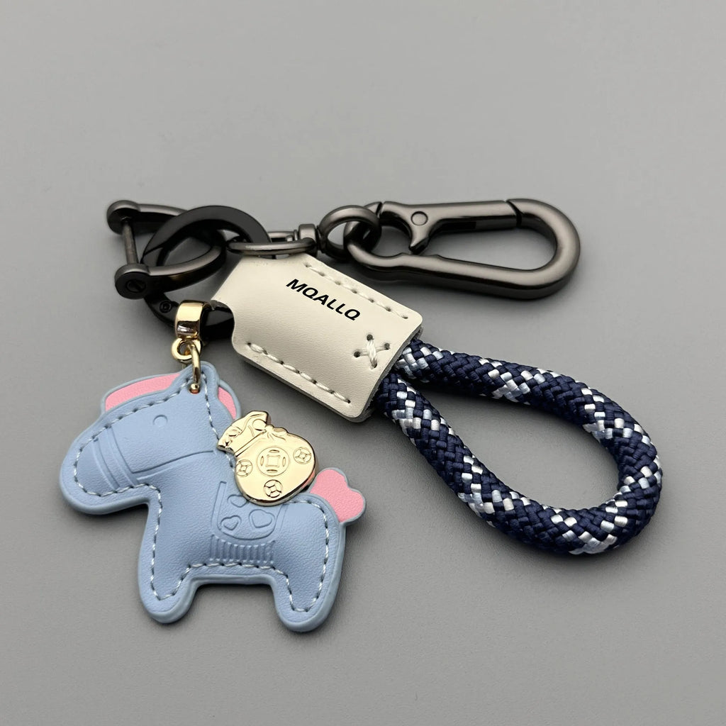 Handmade brown cowhide leather car key ring pendant with a zinc alloy belt buckle and green flanelle rope.