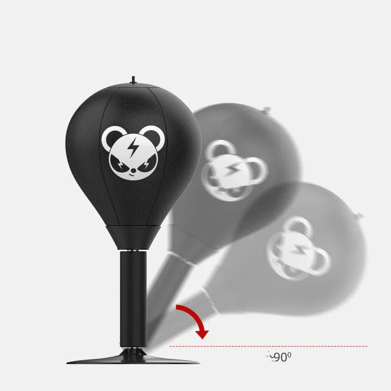Tabletop boxing speed ball with suction cup base and inflatable PU leather sphere on a desk.