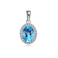 Four-piece 925 Sterling Silver geometric jewellery set with blue topaz gems, showing earrings, ring, pendant, and necklace.
