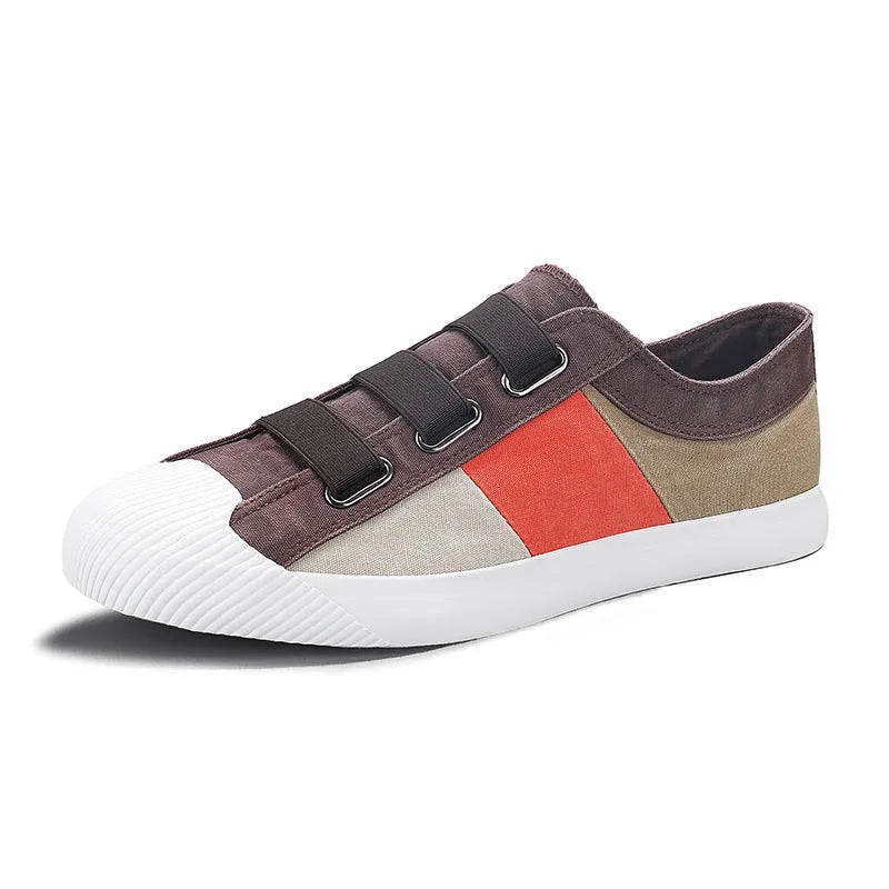 Men's beige canvas low-top sneakers with elastic band closure and a flat rubber sole