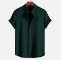 Men's loose fit short sleeve polyester summer shirt on a hanger, shown in a light blue colour.