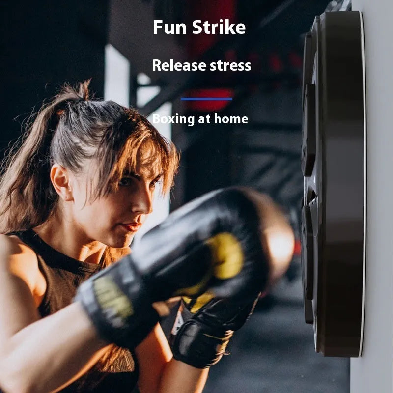 Black leather and PP intelligent music boxing wall target with boxing gloves for home training.